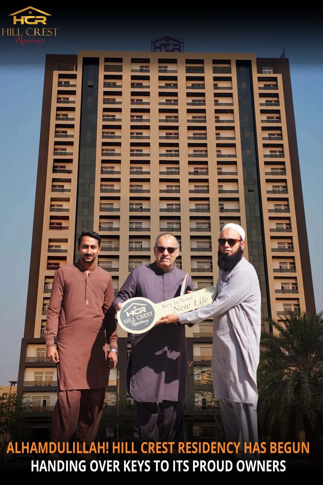 Hill Crest Residency full building view with team and owners